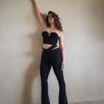 Photo by Tamannaah Bhatia on June 17 2023. May be an image of 1 person jumpsuit and text