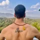 Photo by Akshay Kumar on May May be an image of one or more people biceps and outdoors
