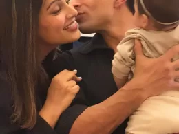 Photo shared by Bipasha Basu on July 26, 2023 tagging @iamksgofficial. May be a selfie of 2 people, baby, people smiling and people kissing.
