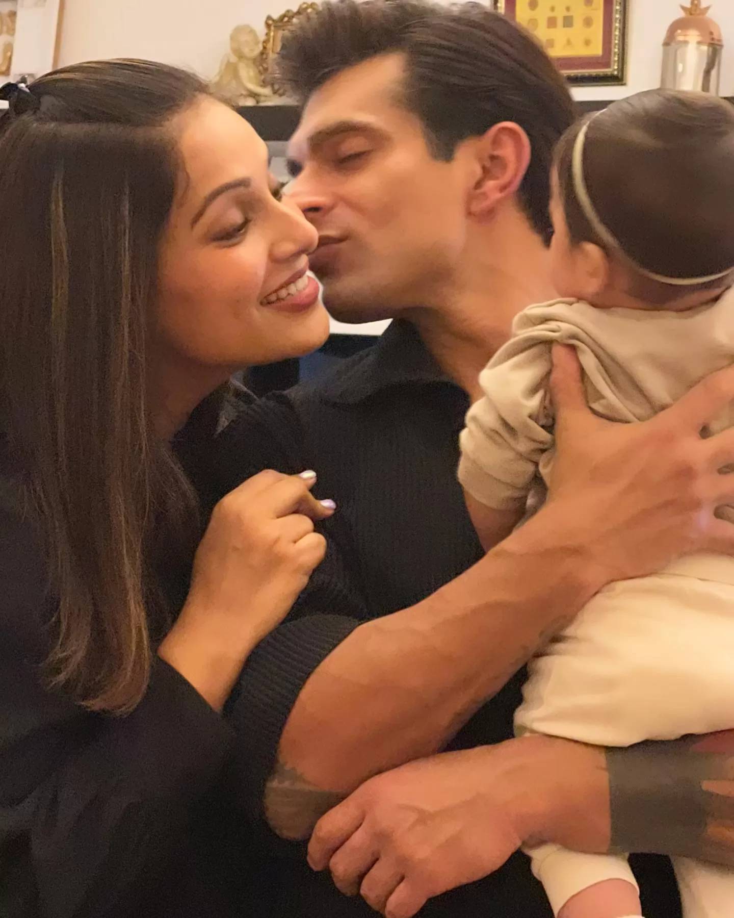 Photo shared by Bipasha Basu on July 26, 2023 tagging @iamksgofficial. May be a selfie of 2 people, baby, people smiling and people kissing.