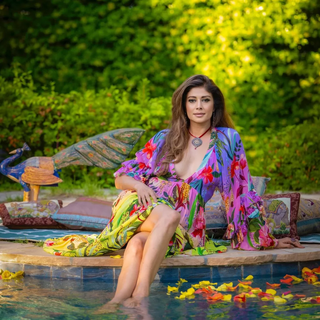 Photo shared by Pooja Batra Shah on August tagging @gabylogrr @billybutchkavitz and @farmrio May be an image of person makeup sarong and pool ()